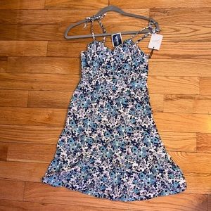 a blue and purple floral dress that is brand new and never been worn